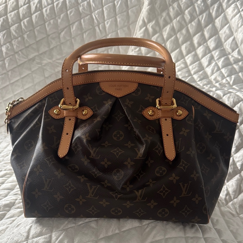 Authentic LOUIS VUITTON Tivoli GM in Monogram canvas